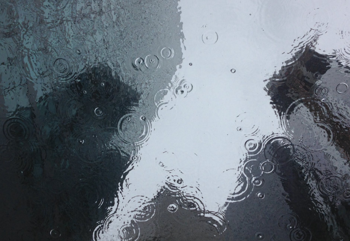 reflection of buildings on a flooded street
